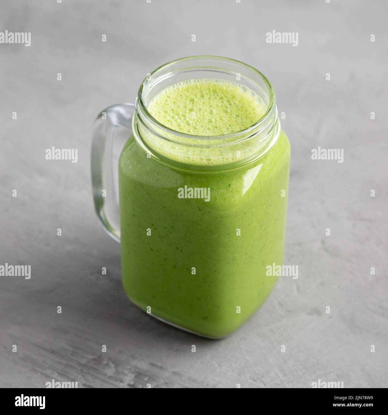 Homemade Greek Yogurt Green Smoothie with Spinach and Banana in a Jar