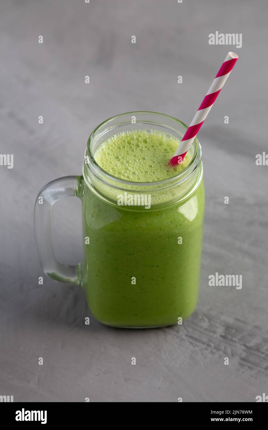 Homemade Greek Yogurt Green Smoothie with Spinach and Banana in a Jar