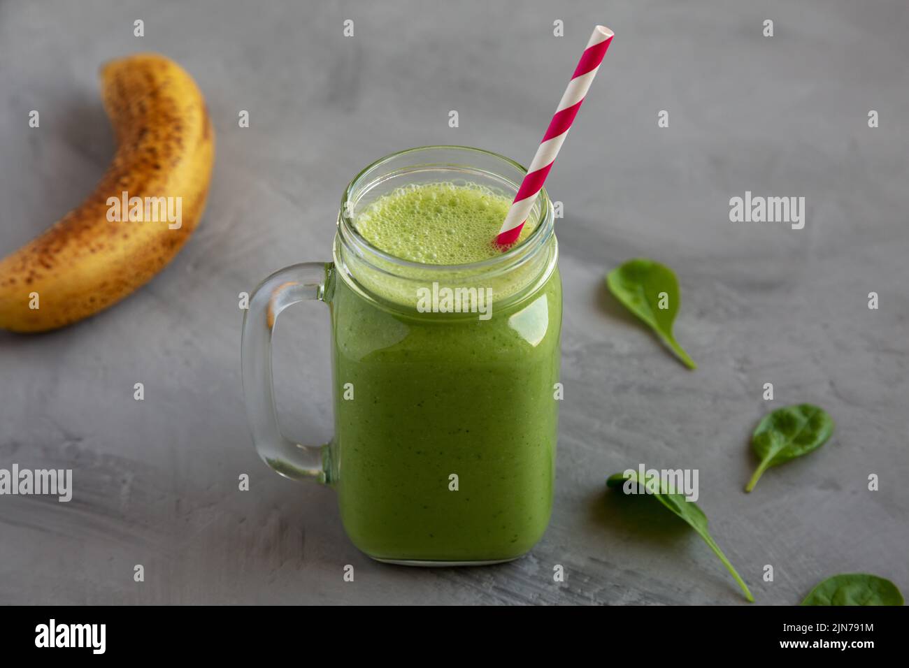 Homemade Greek Yogurt Green Smoothie with Spinach and Banana in a Jar
