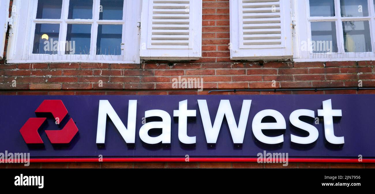 An exterior sign or signage or logo on the Natwest bank branch in Chorlton, Manchester, United Kingdom, British Isles. Stock Photo