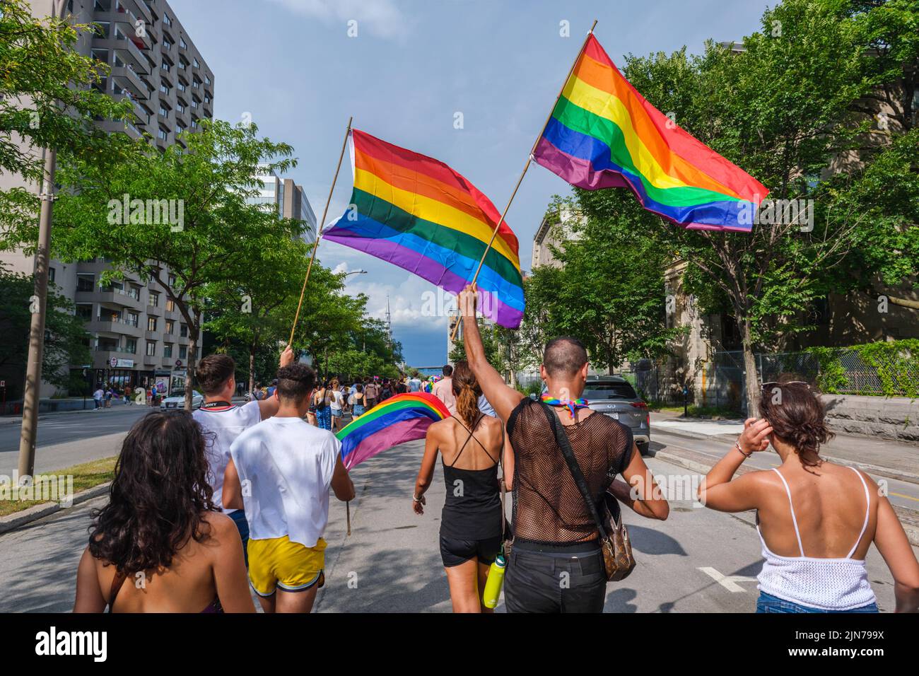 Montreal, CA - 7 August 2022: Many people take part in spontaneous gay pride march after official pride parade was cancelled Stock Photo