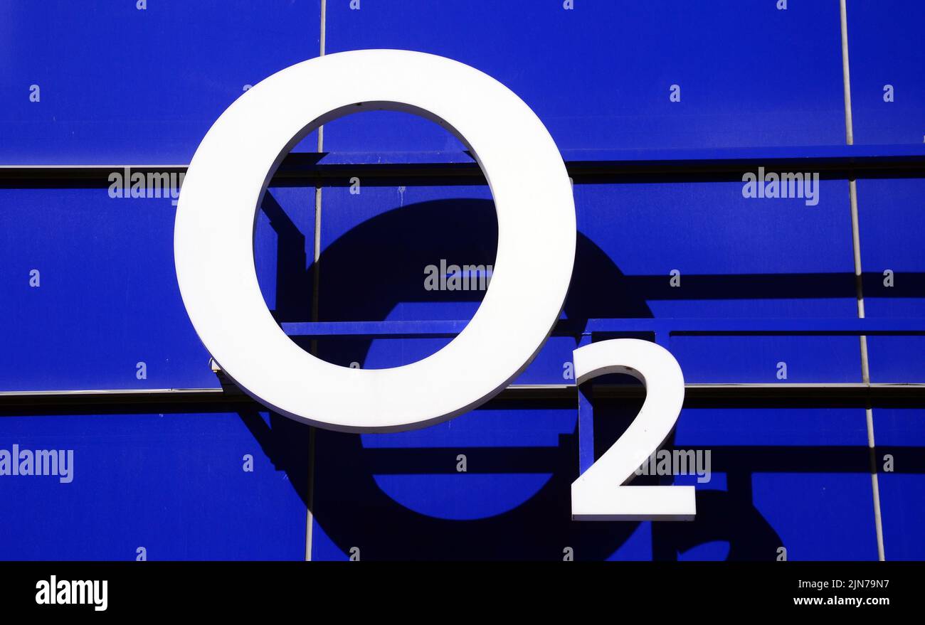 An exterior sign or signage or logo on the O2 shop or store in central Manchester, United Kingdom, British Isles. Stock Photo