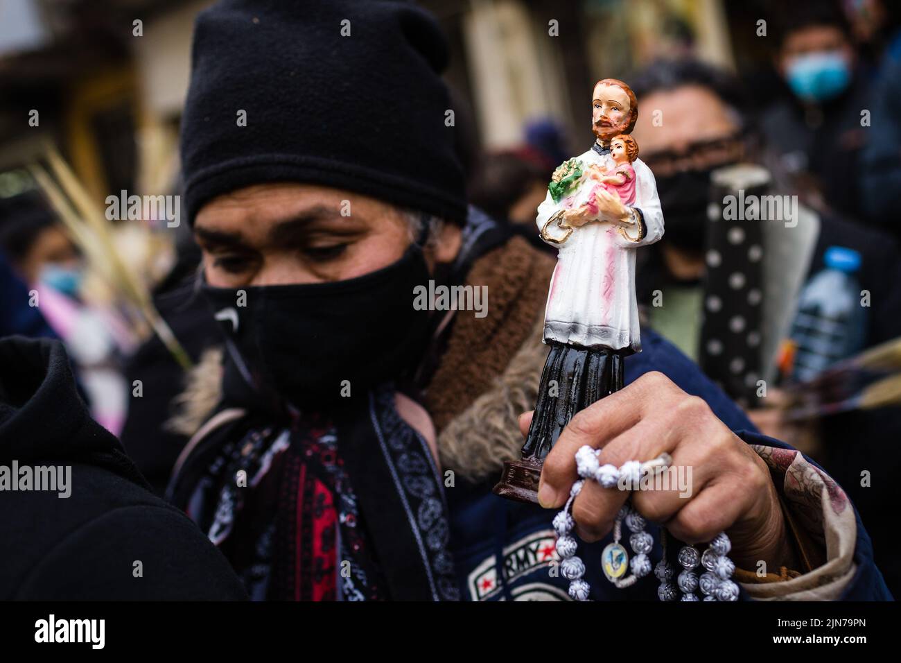 Buenos Aires, Argentina. 07th Aug, 2022. A woman holds in her hand an image of Saint Cayetano during the traditional Mass celebrated every August 7. After two years of pandemic, the great feast of San Cayetano was celebrated again in the church Santuario San Cayetano, in the cosmopolitan neighborhood Liniers of the city of Buenos Aires. As every August 7, many faithful could touch the image and venerate the Saint of Labor to ask for bread, peace and sustenance. Credit: SOPA Images Limited/Alamy Live News Stock Photo