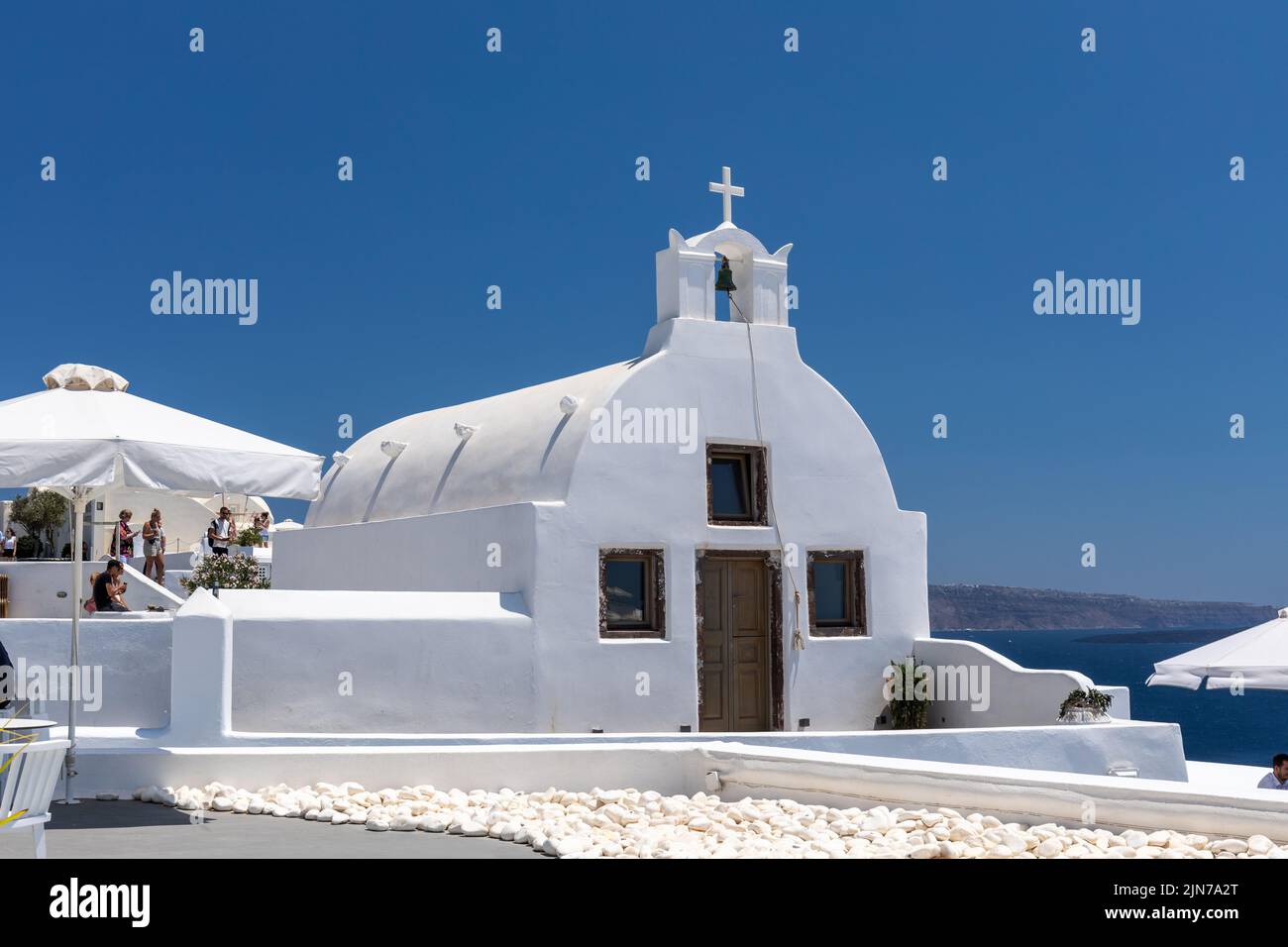 Small traditional white Church of Agios Vasilios in Oia, Santorini, Cyclades islands, Greece, Europe Stock Photo