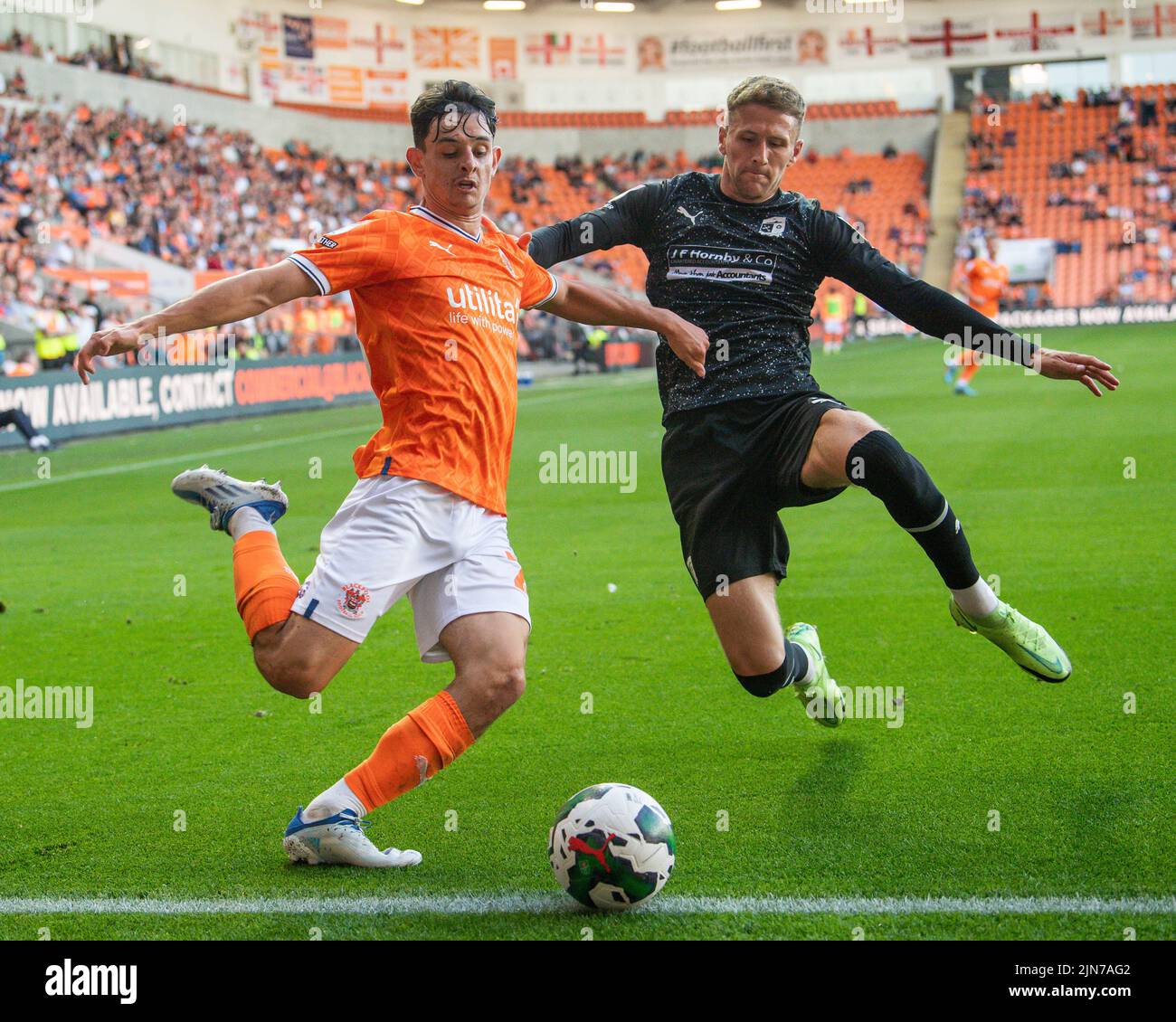 Charlie Patino #28 of Blackpool and Patrick Brough #3 of Barrow battle for the ball in, on 8/9/2022. (Photo by Craig Thomas/News Images/Sipa USA) Credit: Sipa USA/Alamy Live News Stock Photo