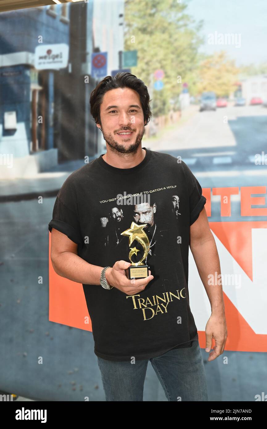Cologne, Germany. 08th Aug, 2022. Actor Alexander Milo poses at the big
