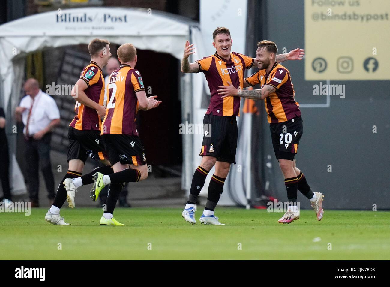 Bradford, UK. 09th Aug, 2022. Harry Chapman #20 celebrates with Andy Cook #9 of Bradford City after he scores to equalise in Bradford, United Kingdom on 8/9/2022. (Photo by Steve Flynn/News Images/Sipa USA) Credit: Sipa USA/Alamy Live News Stock Photo