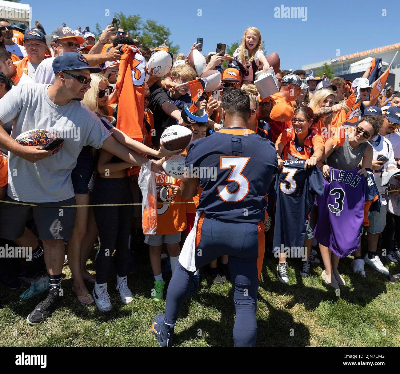 Englewood, Colorado, USA. 30th July, 2022. Denver Broncos QB RUSSELL WILSON signs autographs for fans after Training Camp practice Saturday afternoon. (Credit Image: © Hector Acevedo/ZUMA Press Wire) Stock Photo