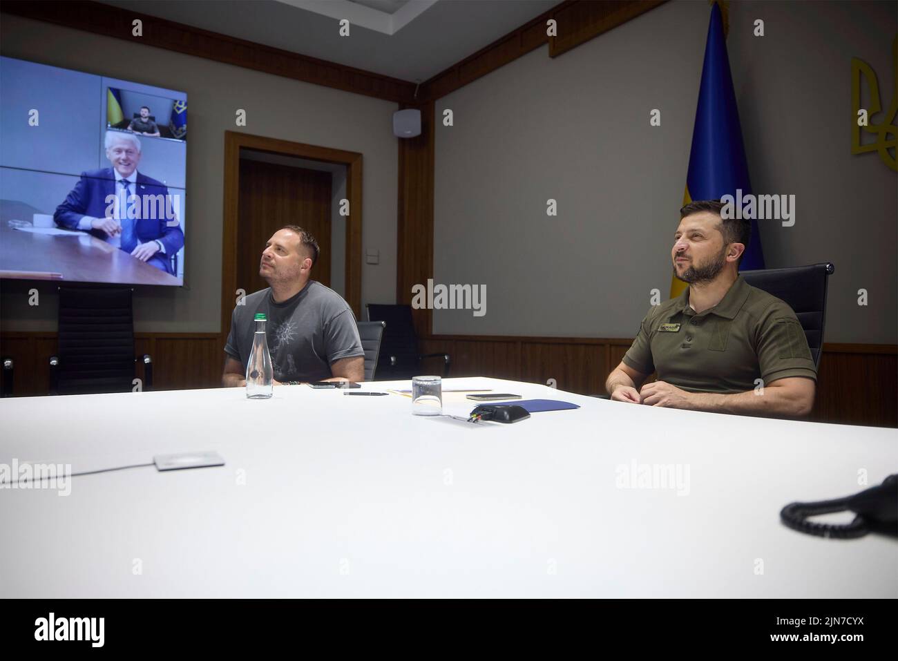 Kyiv, Ukraine. 09th Aug, 2022. Ukrainian President Volodymyr Zelenskyy, right, and Head of the Office of the President Andriy Yermak, left, listen during a video meeting with former U.S. President Bill Clinton from the situation room, August 9, 2022 in Kyiv, Ukraine. Credit: Ukrainian Presidential Press Office/Ukraine Presidency/Alamy Live News Stock Photo