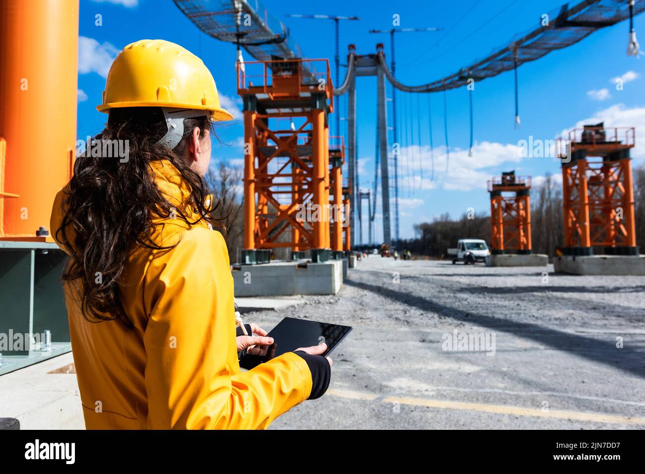 Engineer at work with digital tablet on a sunny spring day Stock Photo