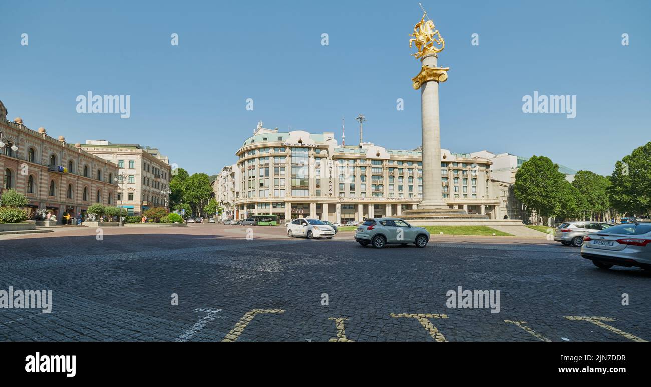 Freedom Square or Liberty Square in the center of Tbilisi,Georgia.  Daylight shot showing the Liberty Monument depicting St George  slaying the dragon Stock Photo