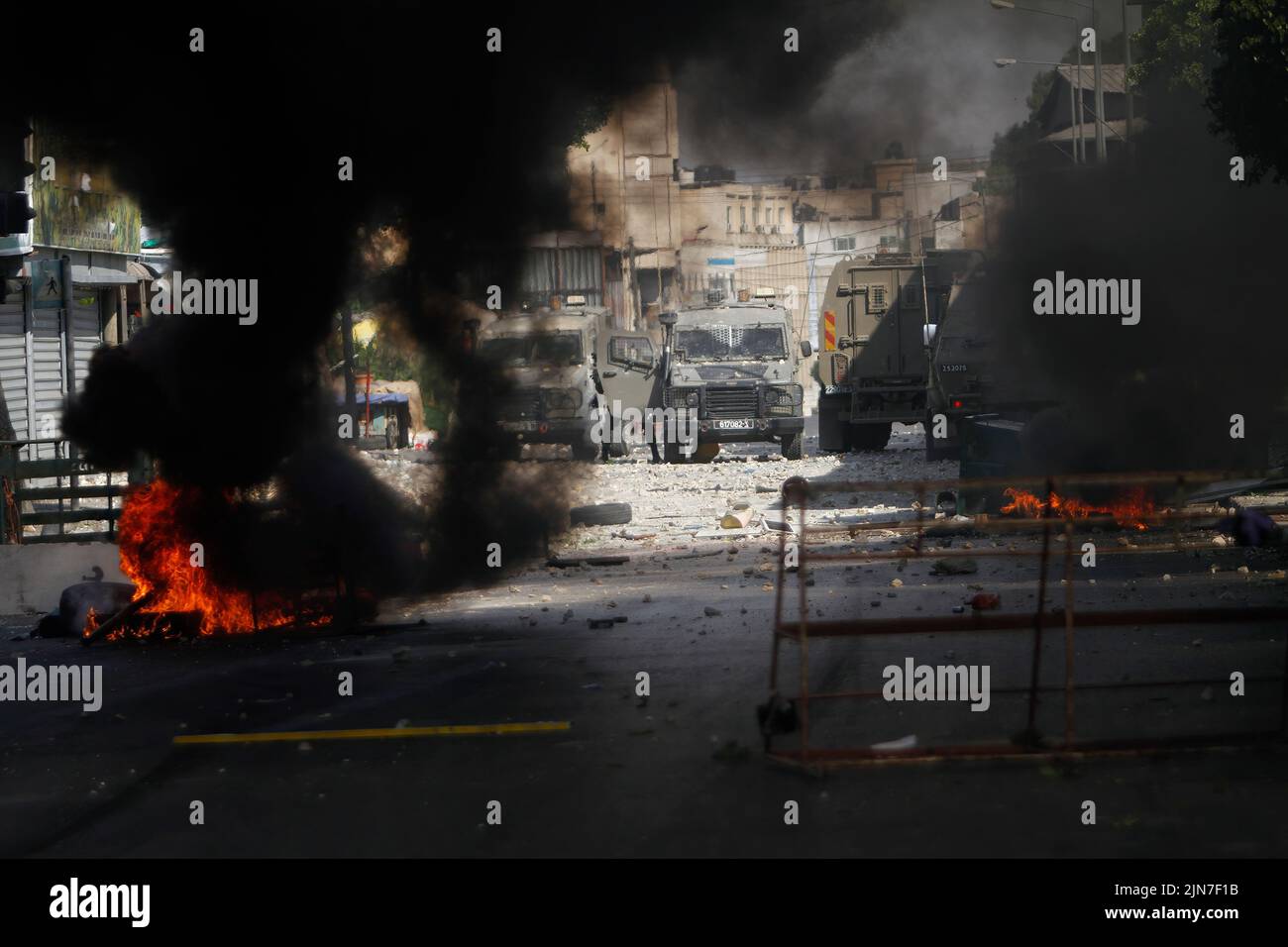 Nablus, Palestine. 02nd Aug, 2022. Military vehicles belonging to the Israeli army seen during the clashes with Israeli army forces after a raid in the Old City of Nablus in the occupied West Bank, the Palestinian Ministry of Health said that 3 Palestinians killed during the raid. Credit: SOPA Images Limited/Alamy Live News Stock Photo