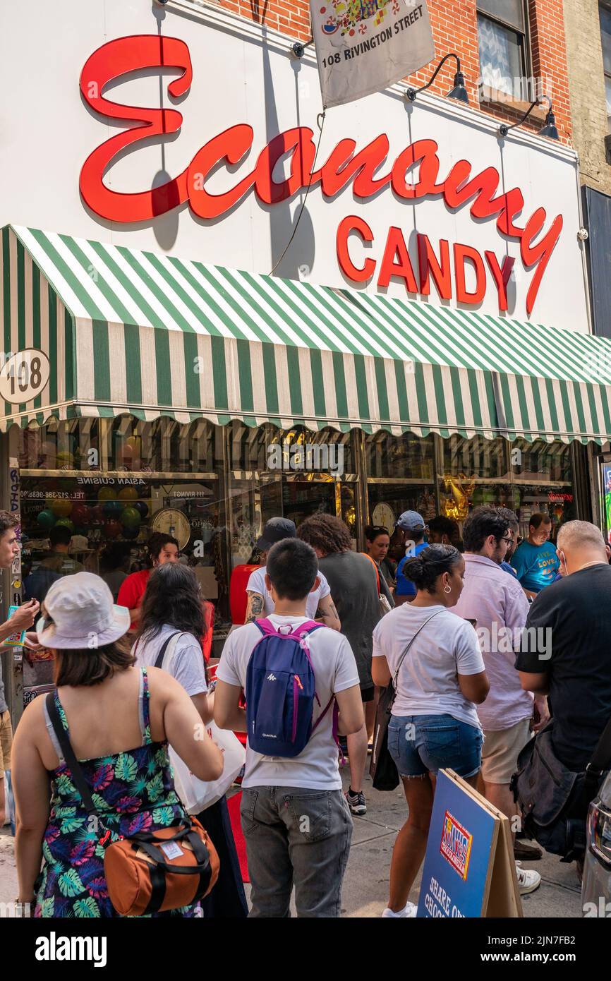 Line outside the famous Economy Candy in the Lower East Side neighborhood in New York as it celebrates its 85th anniversary,  on Saturday, July 30, 2022. ( © Richard B. Levine) Stock Photo