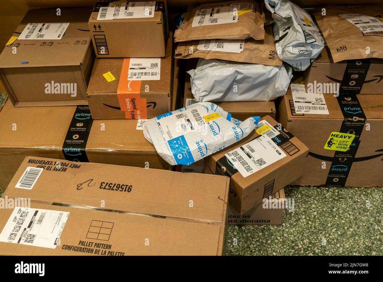 The largesse of online shopping is strewn across the mailbox area in an apartment building in New York on Monday, July 25, 2022. (© Richard B. Levine) Stock Photo