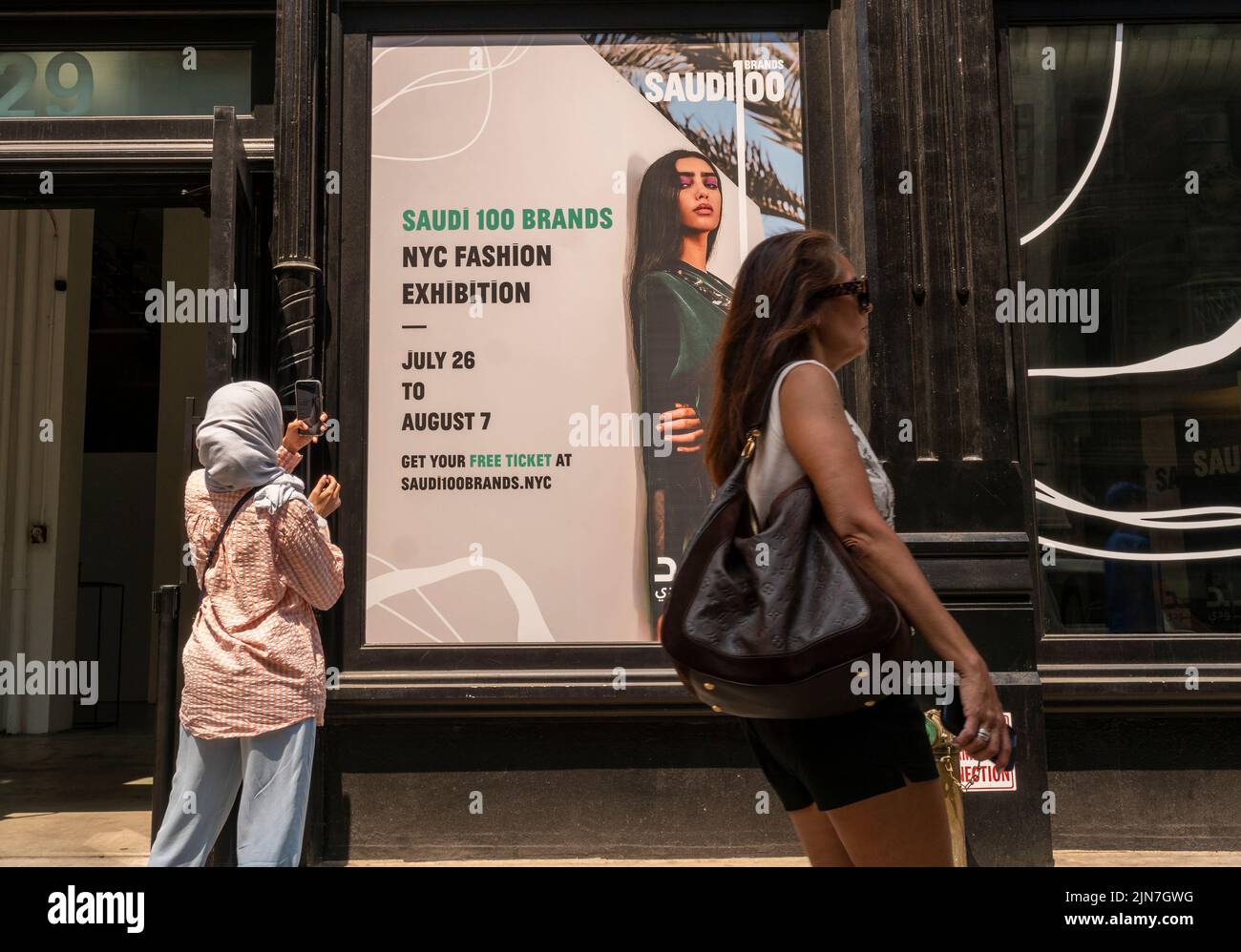 People enter the Saudi 100 Brands fashion exhibit at the Iron23 venue in Flatiron in New York on Wednesday, July 27, 2022. The exhibit organized by the Saudi Arabia Fashion Commission features 100 designers from Saudi Arabia displaying a variety of clothing reflecting Saudi culture. (© Richard B. Levine) Stock Photo