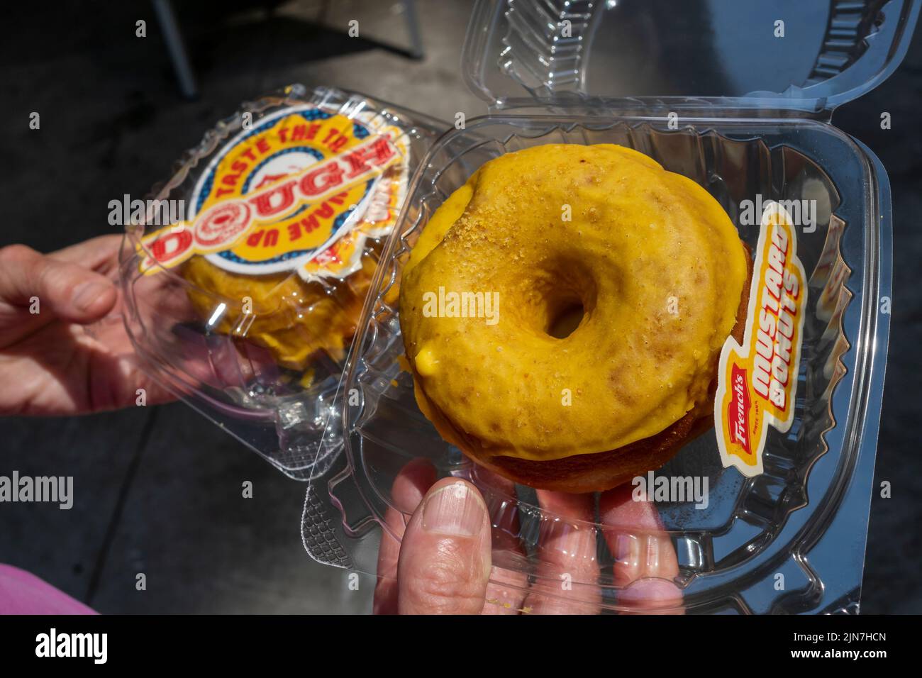 People arrive at the Dough store in the Flatiron neighborhood in New