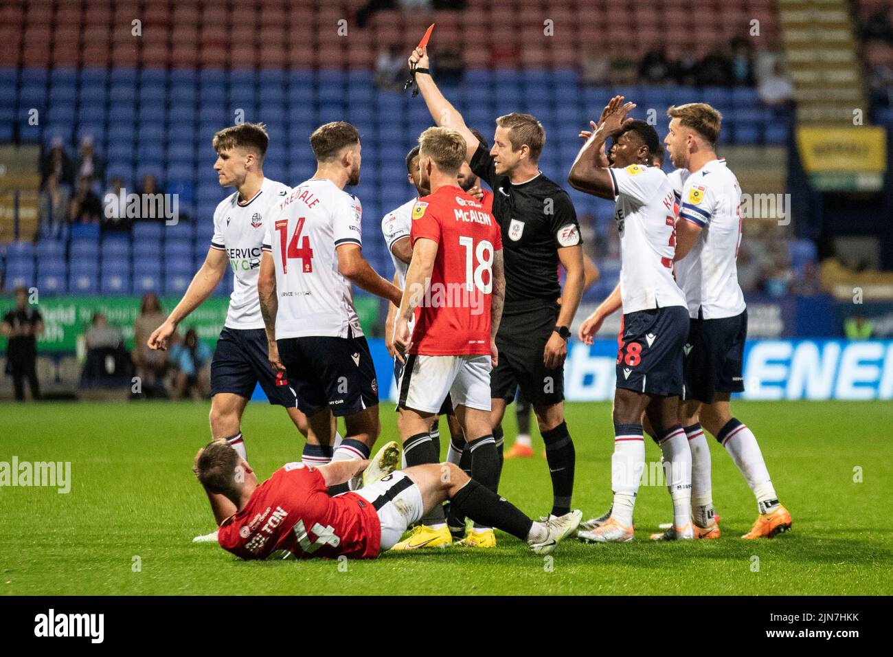 Bolton, UK. 9th August, 2022. referee John Brooks shows a red card to George Thomason (25) of Bolton Wanderers during the Carabao Cup match between Bolton Wanderers and Salford City at the University of Bolton Stadium, Bolton on Tuesday 9th August 2022. (Credit: Mike Morese | MI News) during the Carabao Cup match between Bolton Wanderers and Salford City at the University of Bolton Stadium, Bolton on Tuesday 9th August 2022. (Credit: Mike Morese | MI News) Credit: MI News & Sport /Alamy Live News Stock Photo