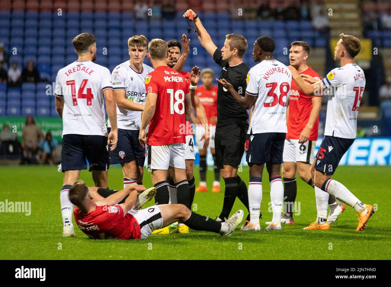 Bolton, UK. 9th August, 2022. referee John Brooks shows a red card to George Thomason (25) of Bolton Wanderers during the Carabao Cup match between Bolton Wanderers and Salford City at the University of Bolton Stadium, Bolton on Tuesday 9th August 2022. (Credit: Mike Morese | MI News) during the Carabao Cup match between Bolton Wanderers and Salford City at the University of Bolton Stadium, Bolton on Tuesday 9th August 2022. (Credit: Mike Morese | MI News) Credit: MI News & Sport /Alamy Live News Stock Photo