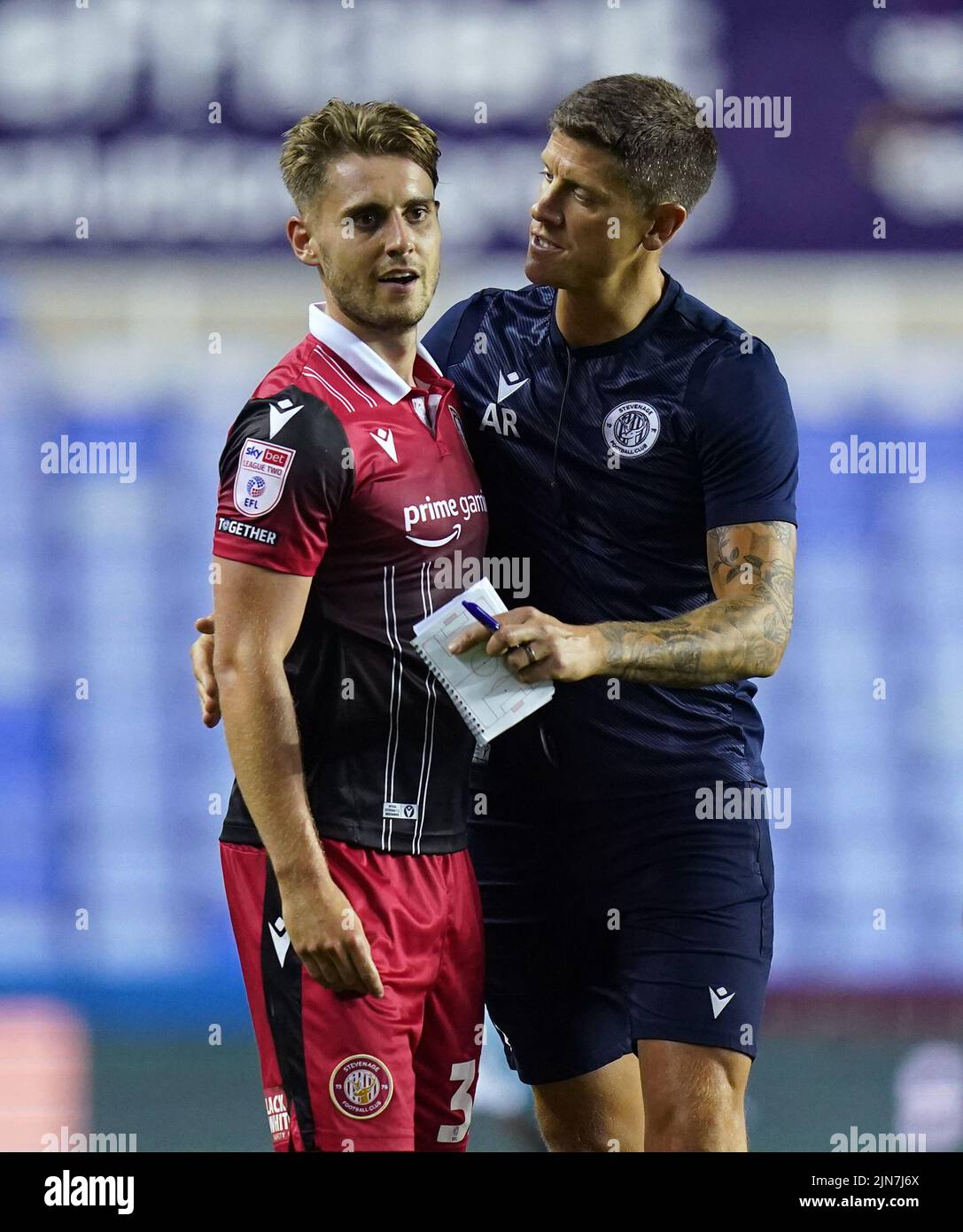 Stevenage's Danny Rose (left) celebrates with first team coach Alex Revell after the Carabao Cup, first round match at the Select Car Leasing Stadium, Reading. Picture date: Tuesday August 9, 2022. Stock Photo