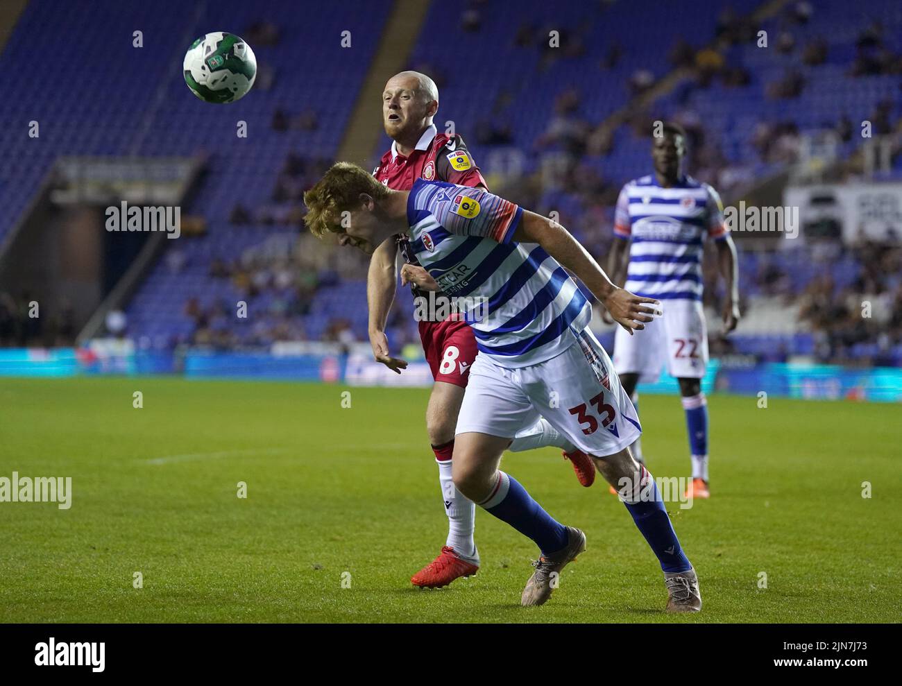 Stevenage's Jake Taylor (left) and Reading's John Clarke battle for the ball during the Carabao Cup, first round match at the Select Car Leasing Stadium, Reading. Picture date: Tuesday August 9, 2022. Stock Photo