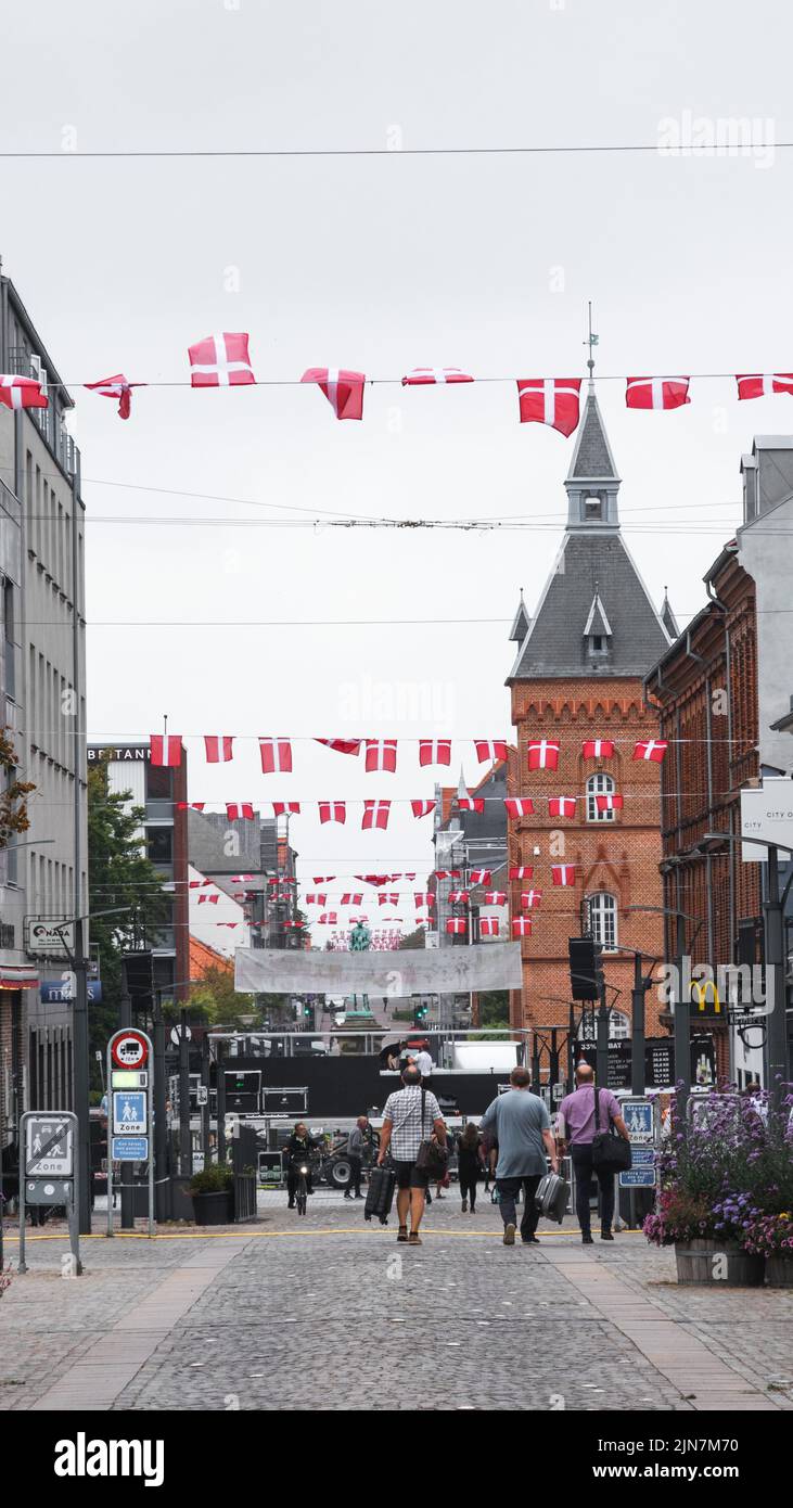 Main pedestrian Street of Esbjerg, Denmark decorated with Danish flag Stock Photo