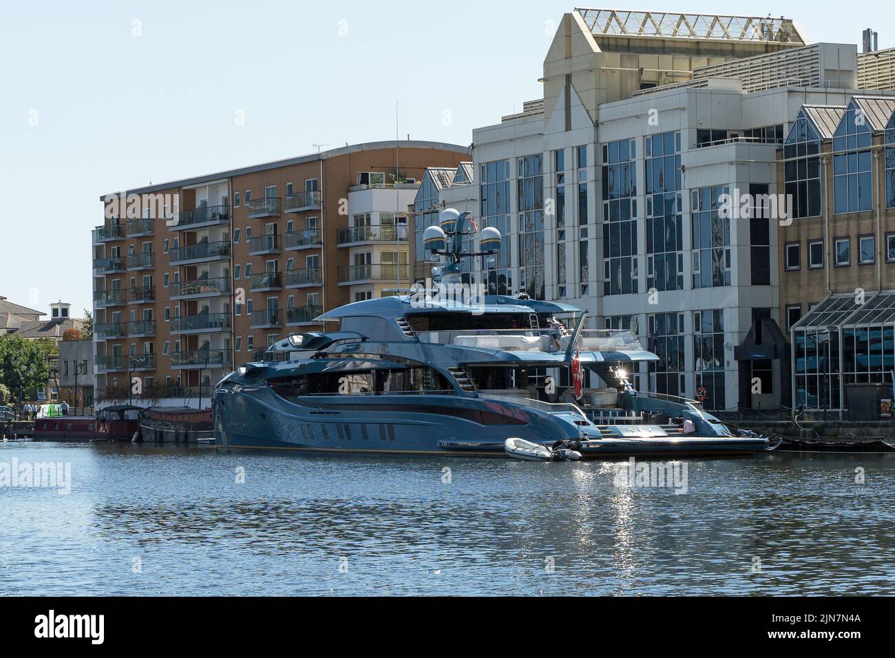 Super yacht moored up in the docklands of Canary Wharf. London - 9th August 2022 Stock Photo