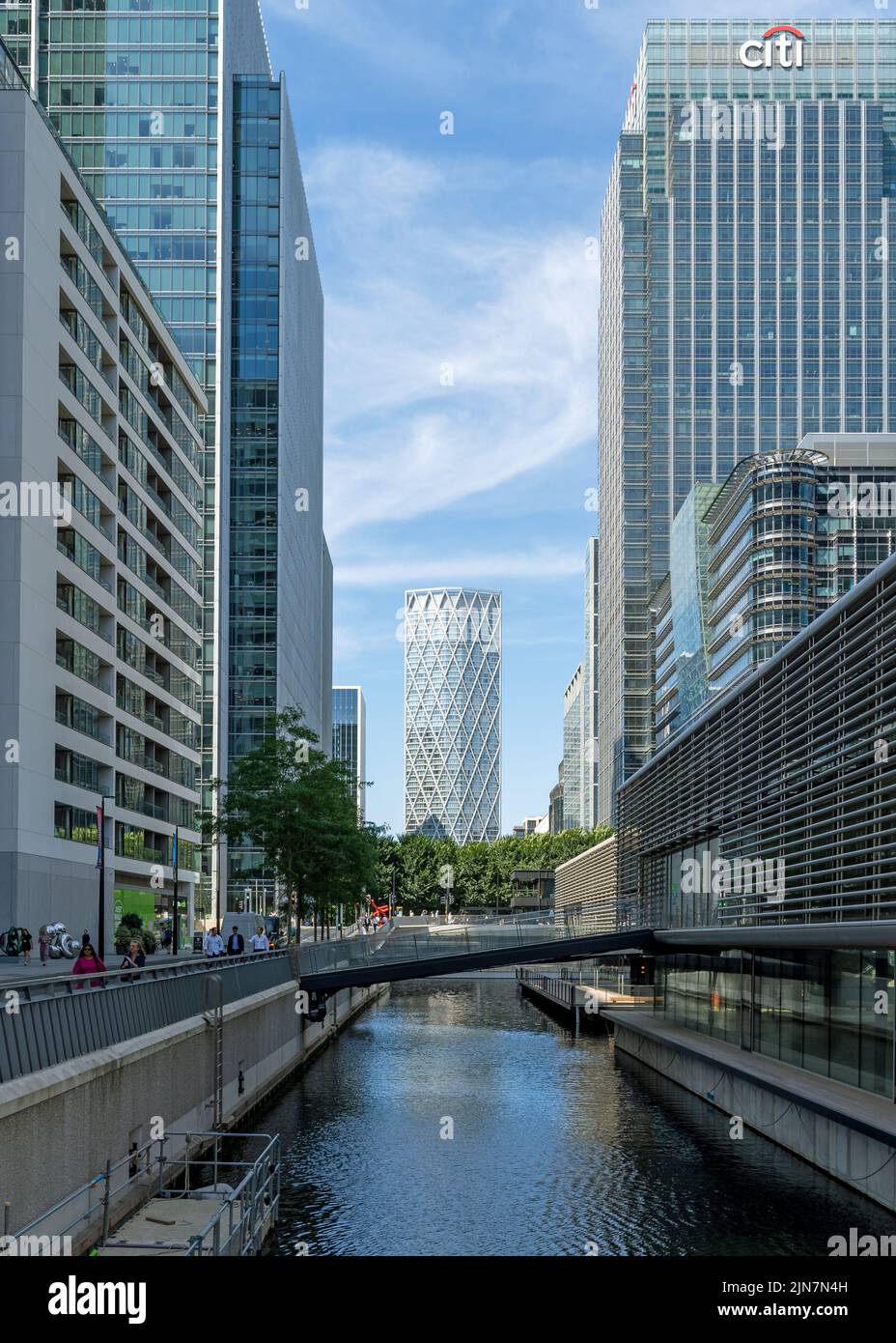 Looking down the docks of Canary Wharf to the Newfoundland apartment building skyscraper in the