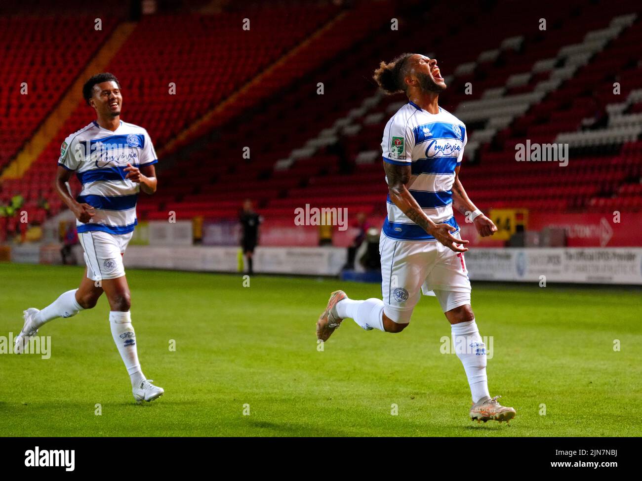 Queens Park Rangers' Tyler Roberts (right) celebrates scoring their side's first goal of the game during the Carabao Cup, first round match at The Valley, London. Picture date: Tuesday August 9, 2022. Stock Photo