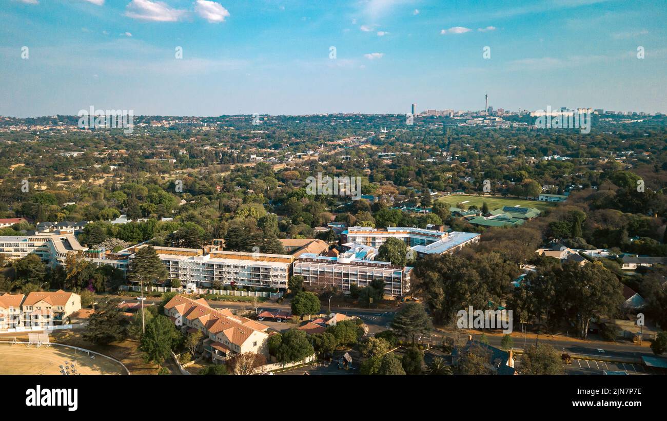 An aerial view of buildings and trees in Johannesburg, South Africa ...