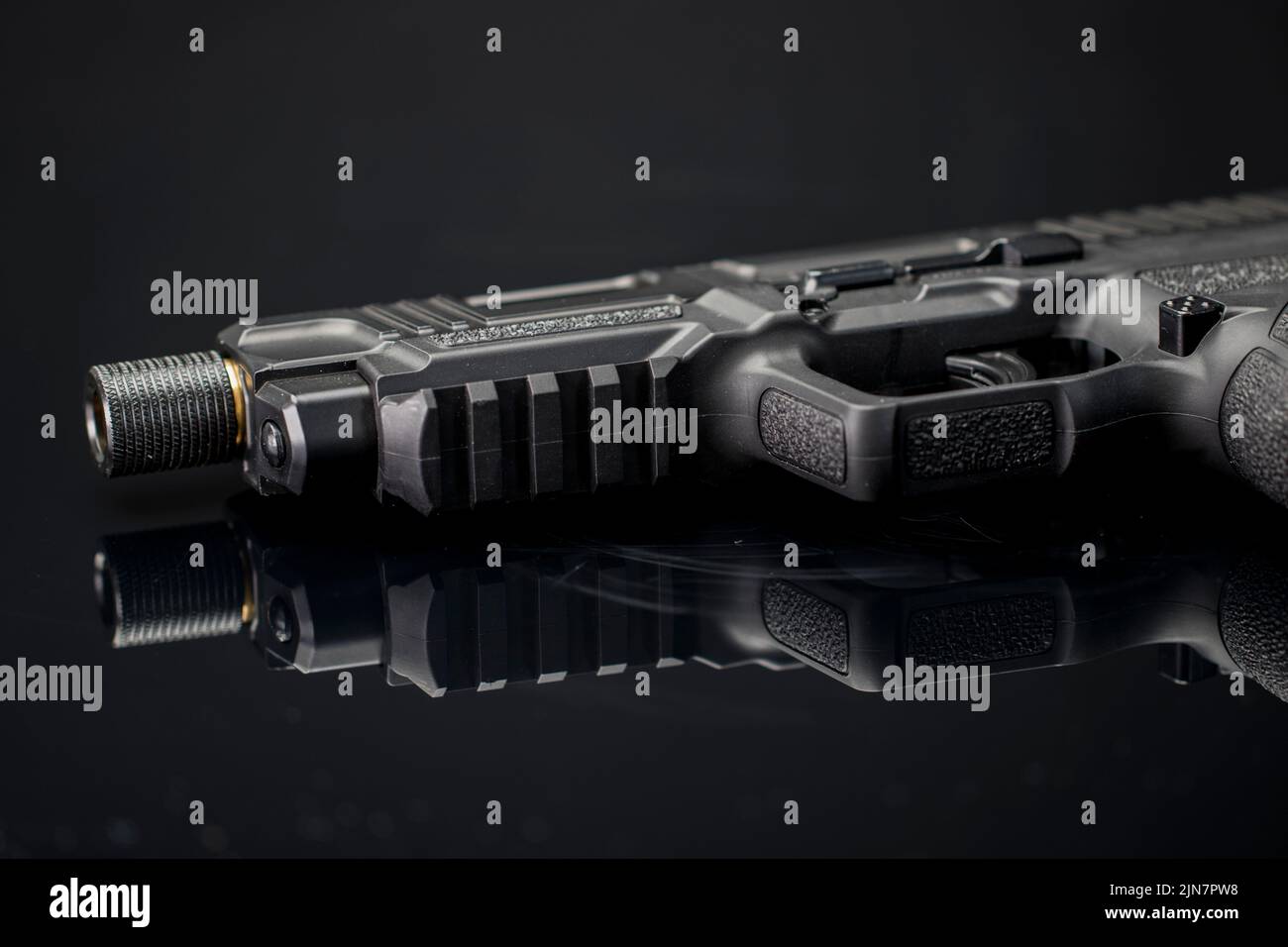 Hand gun black hand gun close up. Handgun weapon for self defense. Stock Photo