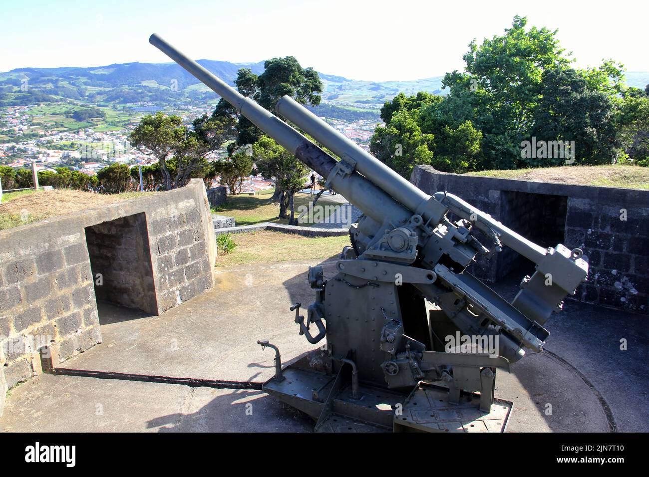 WWII-era anti-aircraft cannon on Mount Brazil, at the battery near the Pico das Cruzinhas, Angra do Heroismo, Terceira, Azores, Portugal Stock Photo