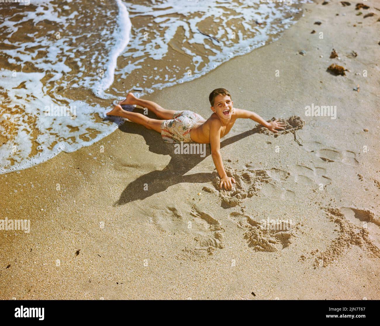 High Angle View of Young Boy on Beach, Delray Beach, Florida, USA, Toni Frissell Collection, 1947 Stock Photo