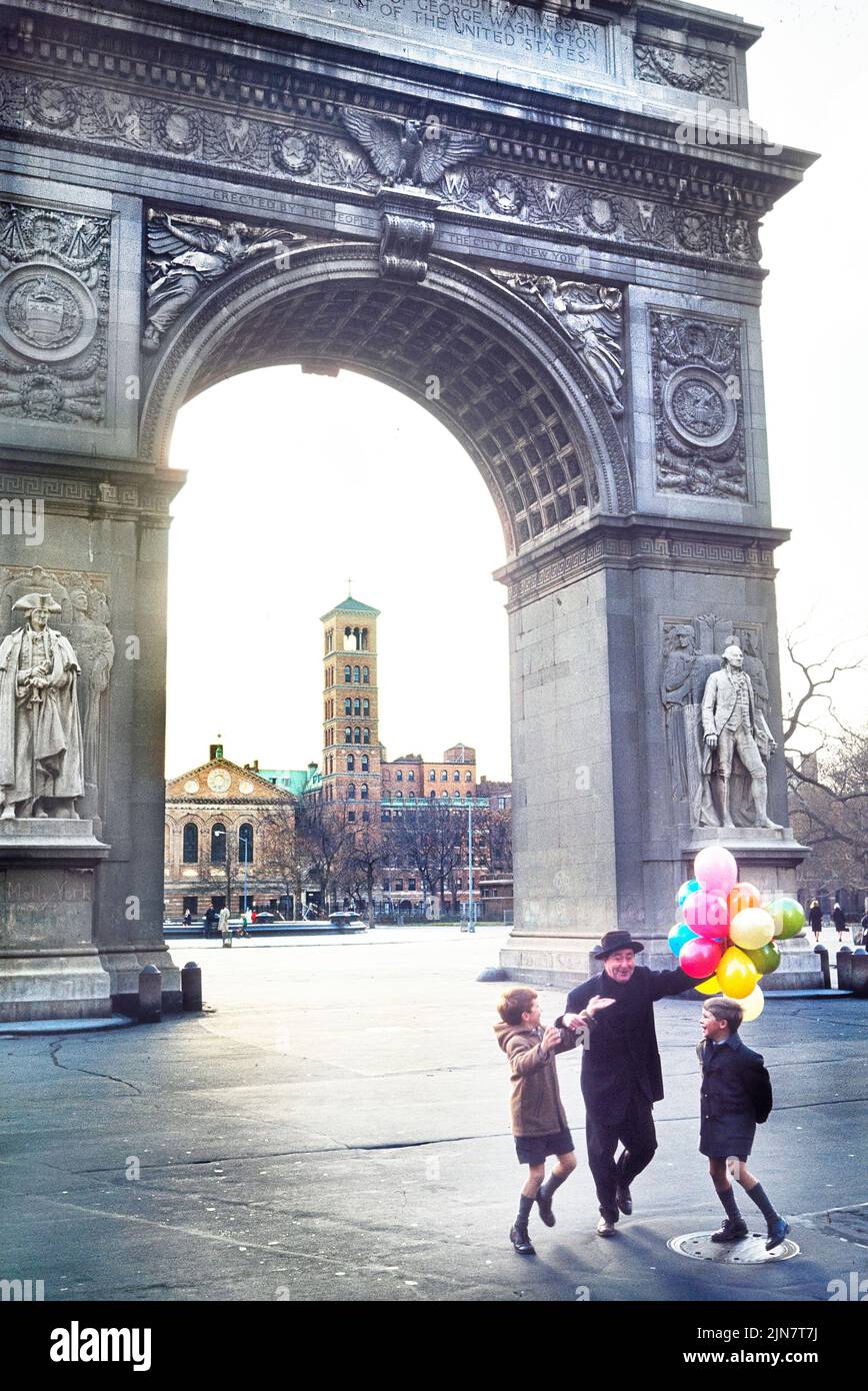 Man and Two Boys with bunch of Balloons, Washington Square, Greenwich