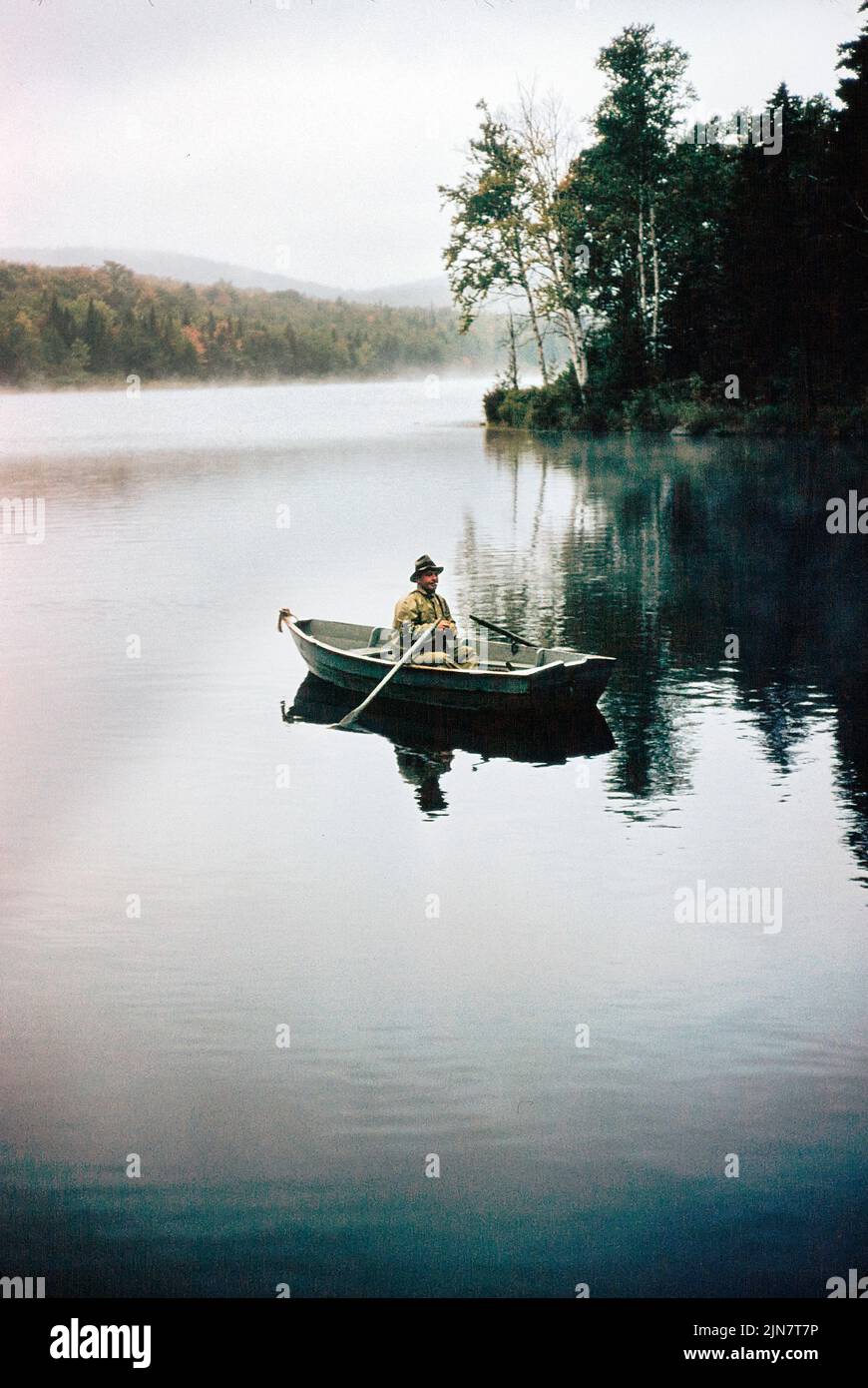 Man Trout Fishing from Row Boat, Groton, Vermont, USA, Toni Frissell Collection, 1956 Stock Photo