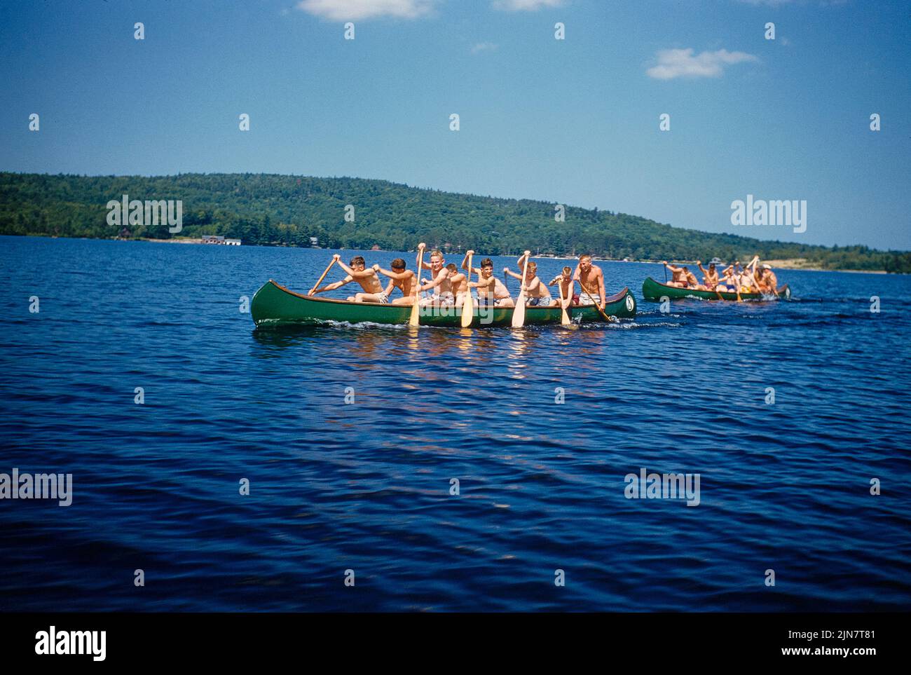 Camp Boys rowing Canoes, Camp Sunapee, New Hampshire, USA, Toni