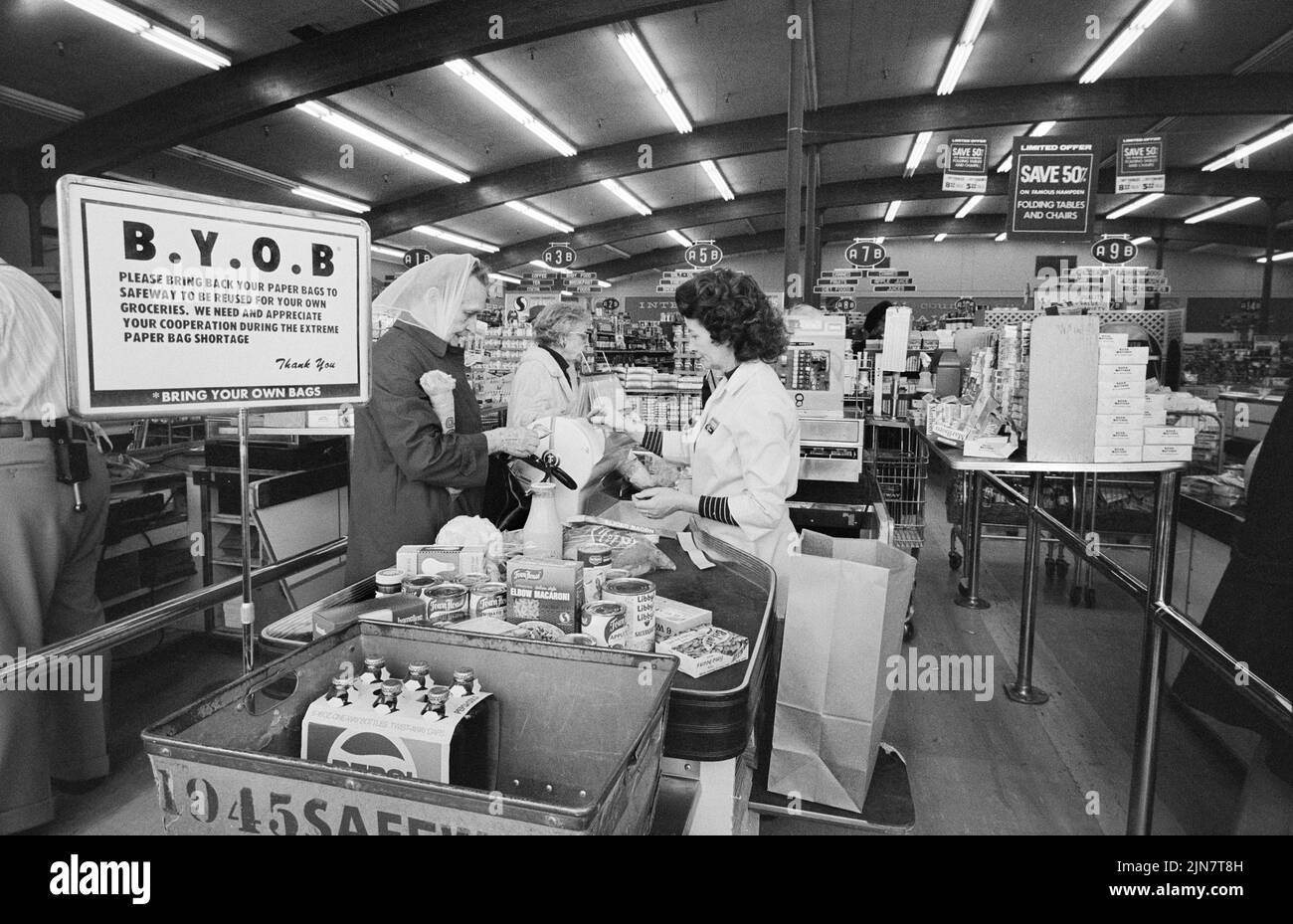 Grocery store signs about shopping bags, Marion S. Trikosko, U.S. News & World Report Magazine Photograph Collection, February 1974 Stock Photo