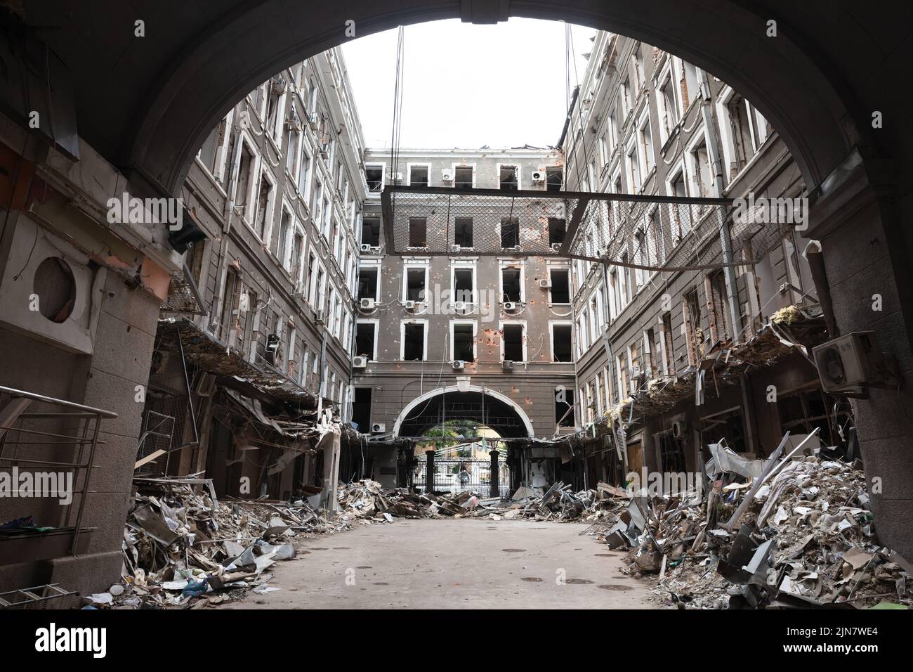 A ruined apartment seen in Kharkiv. Destroyed building in historical downtown in Kharkiv, Ukraine - 1 Aug 2022 Stock Photo