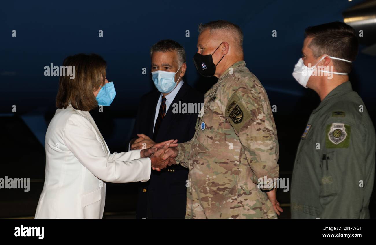 Gen. Paul LaCamera, commander of United Nations Command, Combined Forces Command, and U.S. Forces Korea, greets Nancy Pelosi, Nancy Pelosi, Speaker of the U.S. House of Representatives, at Osan Air Base, Republic of Korea, Aug. 3, 2022. During the visit to Korea the delegation met with Korean National Assembly Speaker Kim Jin-pyo along with senior ROK officials, spoke with the President of the Republic of Korea Yoon Suk-yeol, toured the Joint Security Area / Demilitarized Zone, and spoke with service members at the JSA and Osan Air Base.     This visit was part of a congressional delegation to Stock Photo