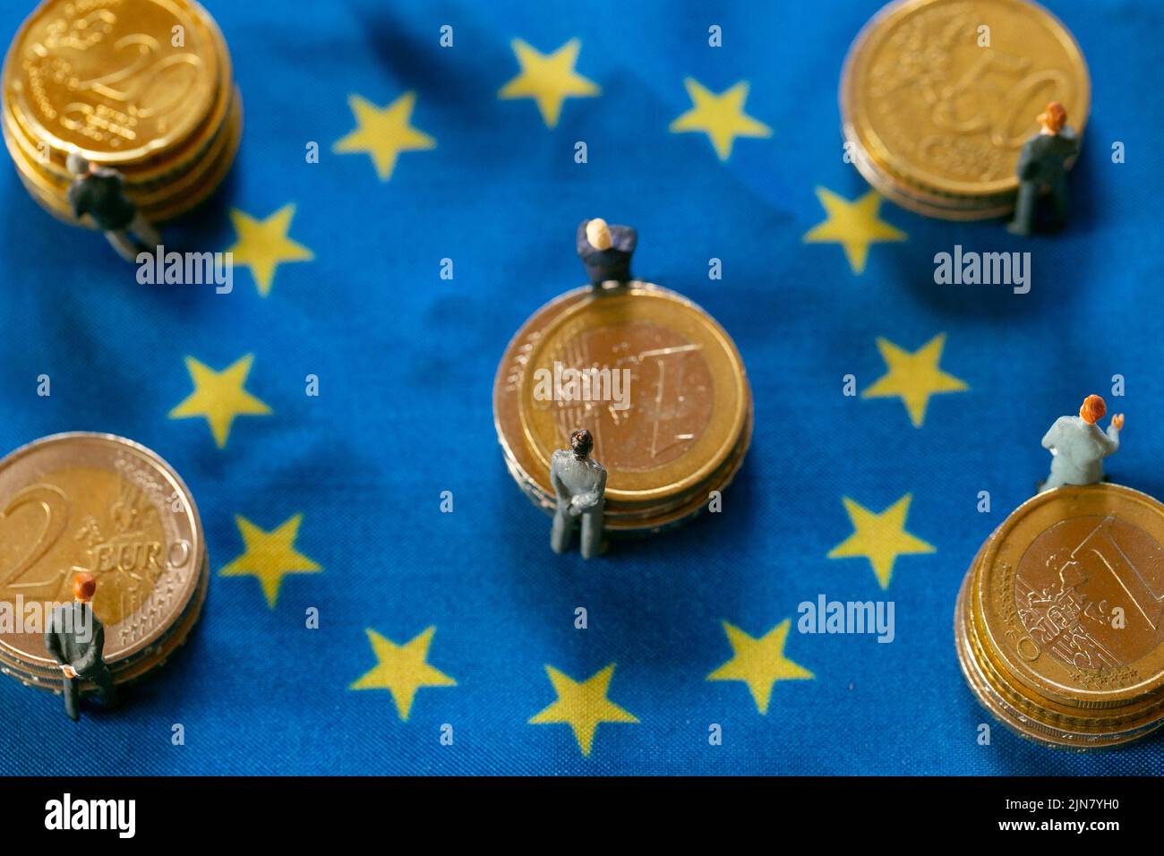 Politicians and businessmen of European countries.state of the economy in in European countries.Figures of men in suits on euro coins on european Stock Photo