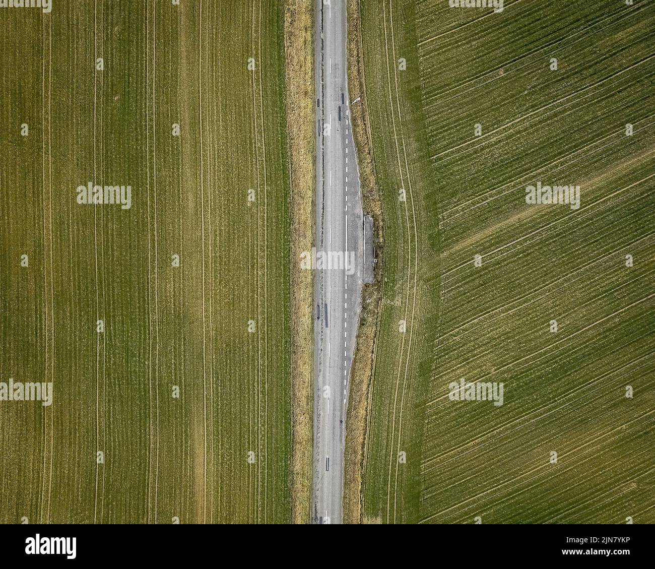 an aerial view of a road between industrial fields Stock Photo Alamy