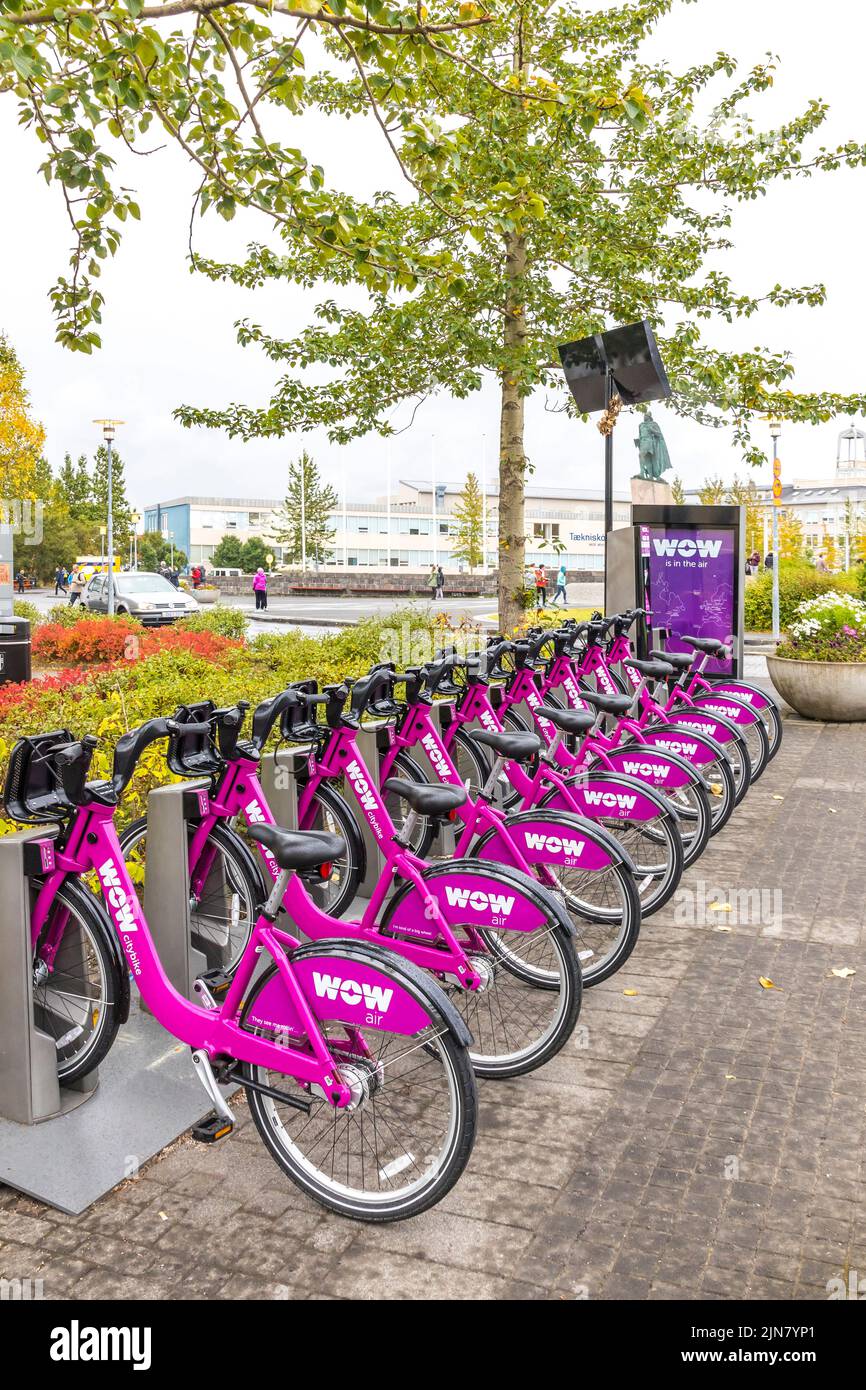 Reykjavik, Iceland - September 5, 2017: Row of bicycles on the docking station of WOW Air public bike-sharing system on the streets of Reykjavik Stock Photo
