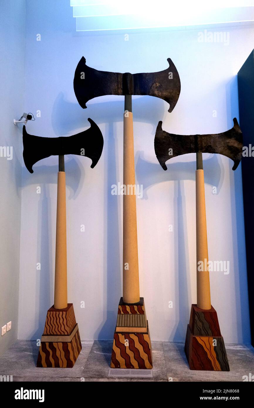 Three axes on display in the Heraklion Archaeological Museum in Crete Greece Stock Photo
