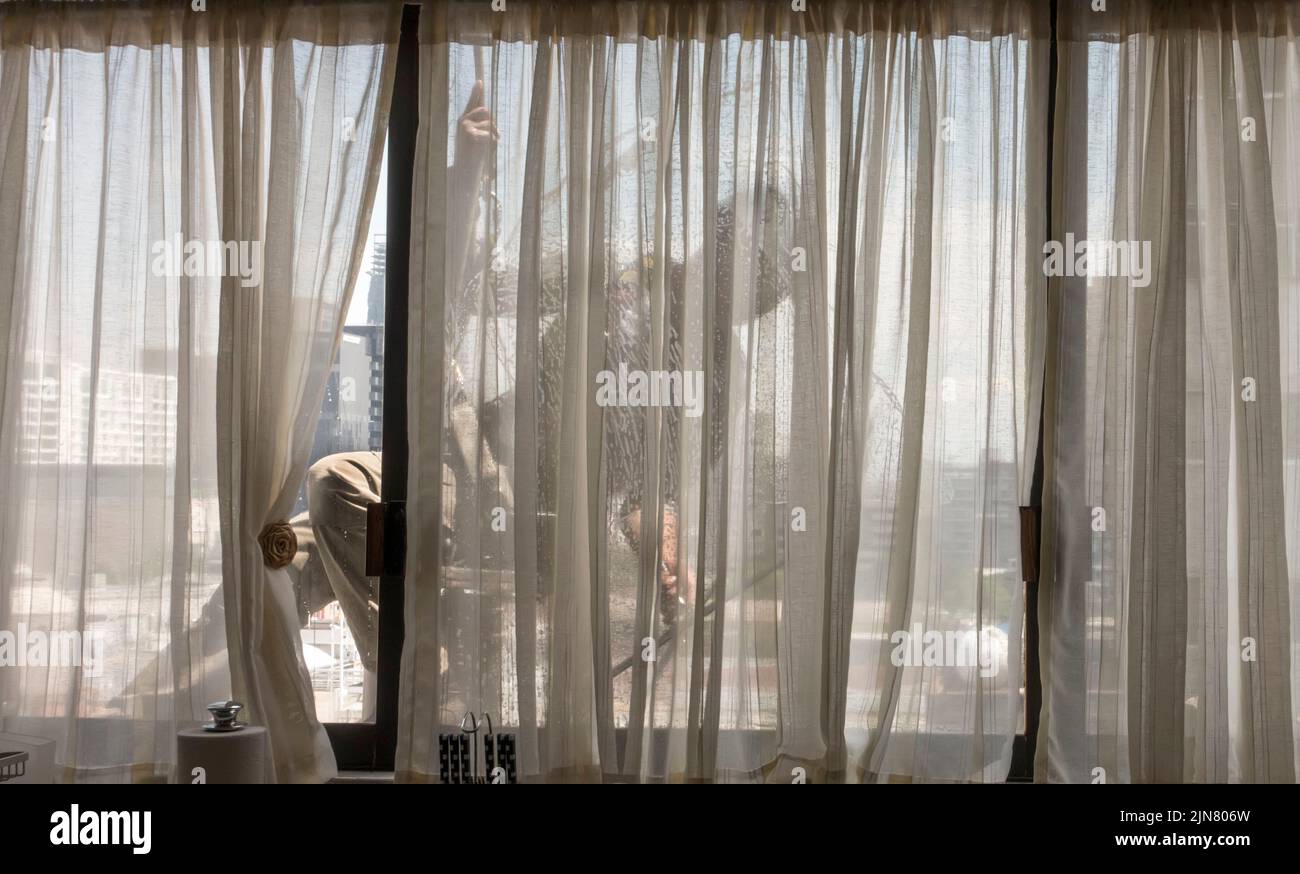 Window cleaner viewed from inside Stock Photo