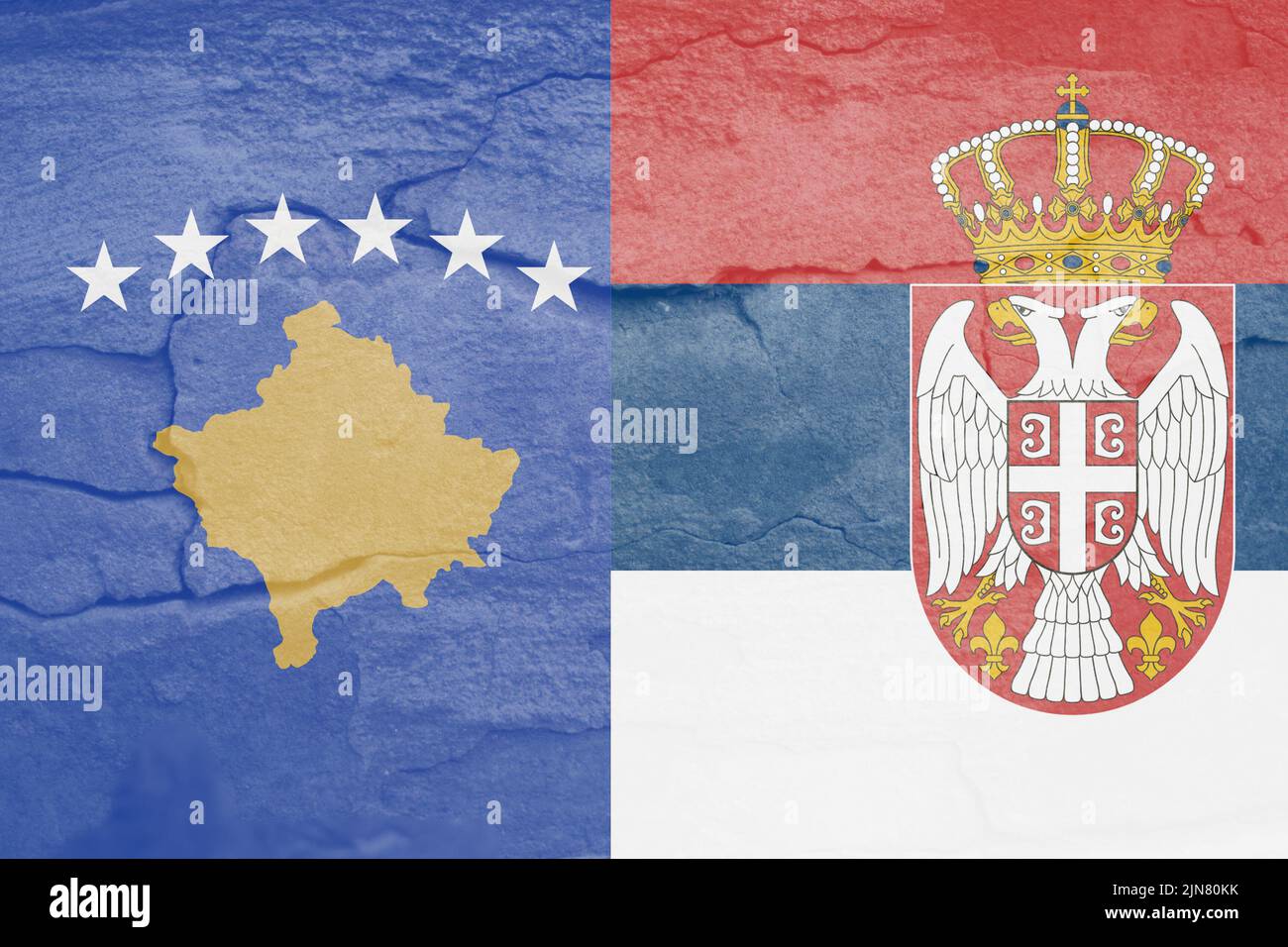 Defocus Serbia flag, official colors and proportion correctly. National Serbia flag. Stone wall background. Crack. Serbia and Kosovo conflict. Country Stock Photo