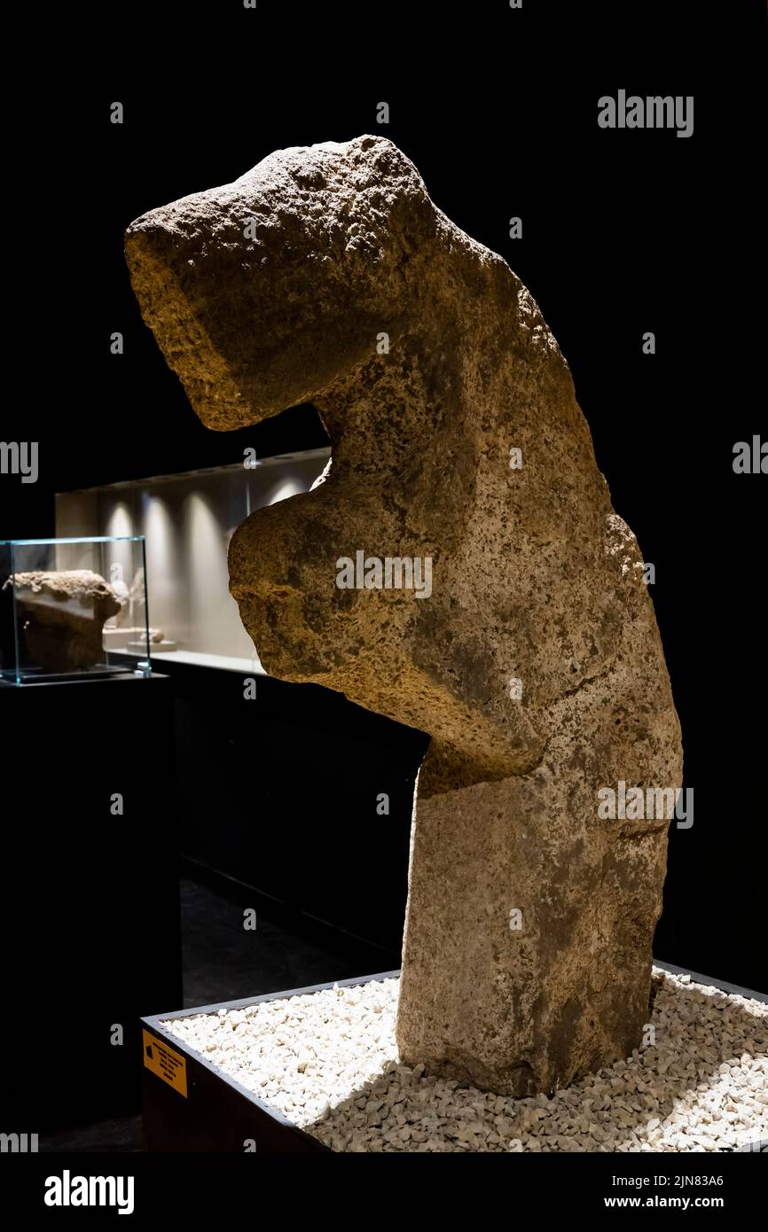 Human carrying a leopard on back, limestone carving, Sanlıurfa Museum, neolithic, from Karahantepe, Sanliurfa(Urfa), Turkey, Asia Minor, Asia Stock Photo