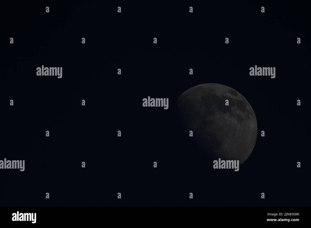 Waxing Gibbous Moon through telescope Stock Photo Alamy