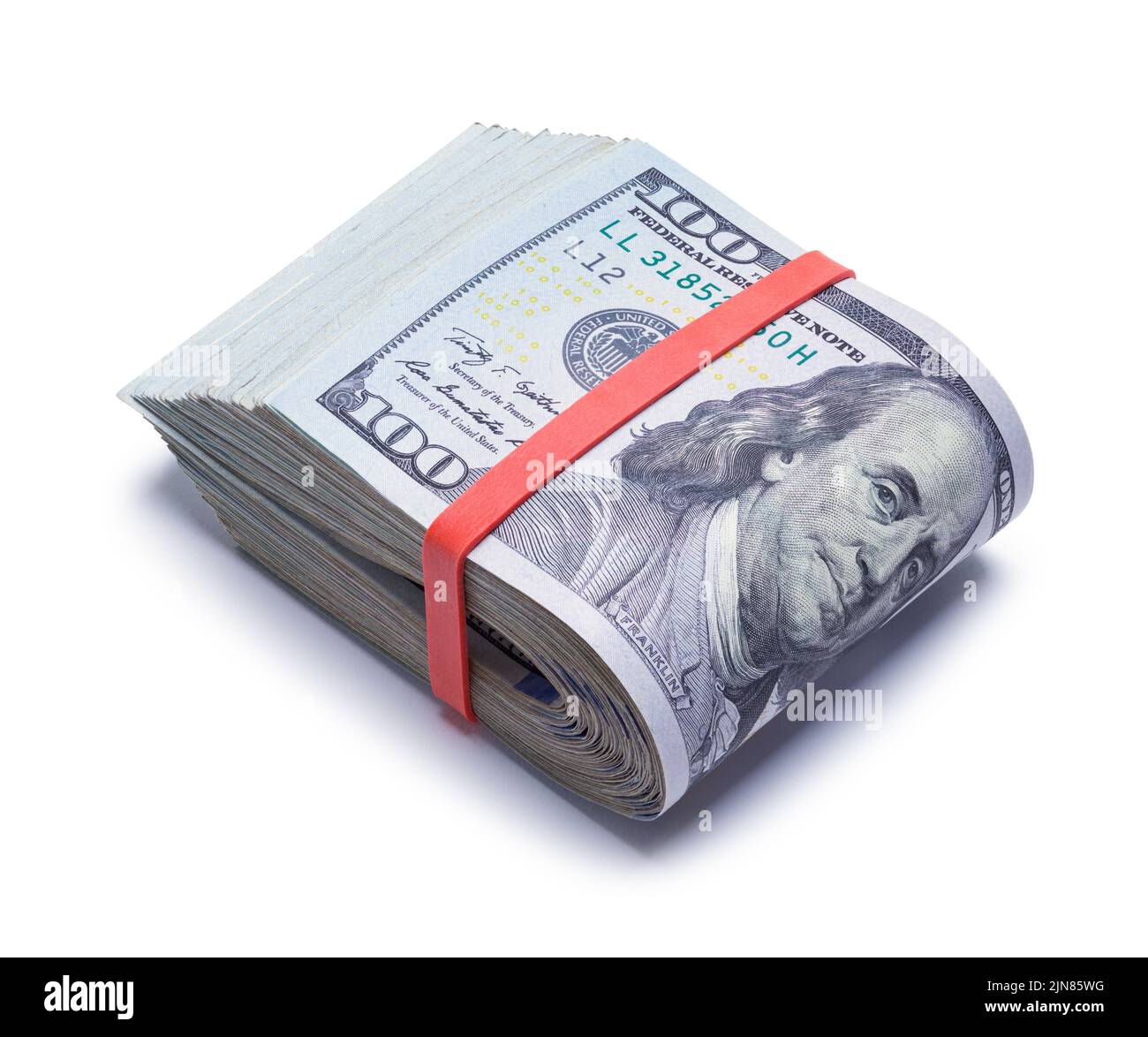 Large Folded Wad of Money Cut Out on White. Stock Photo