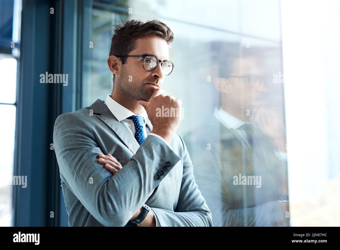 Premium Photo  Young bearded man in sunglasses sitting on a wooden park  bench planning his next chess move