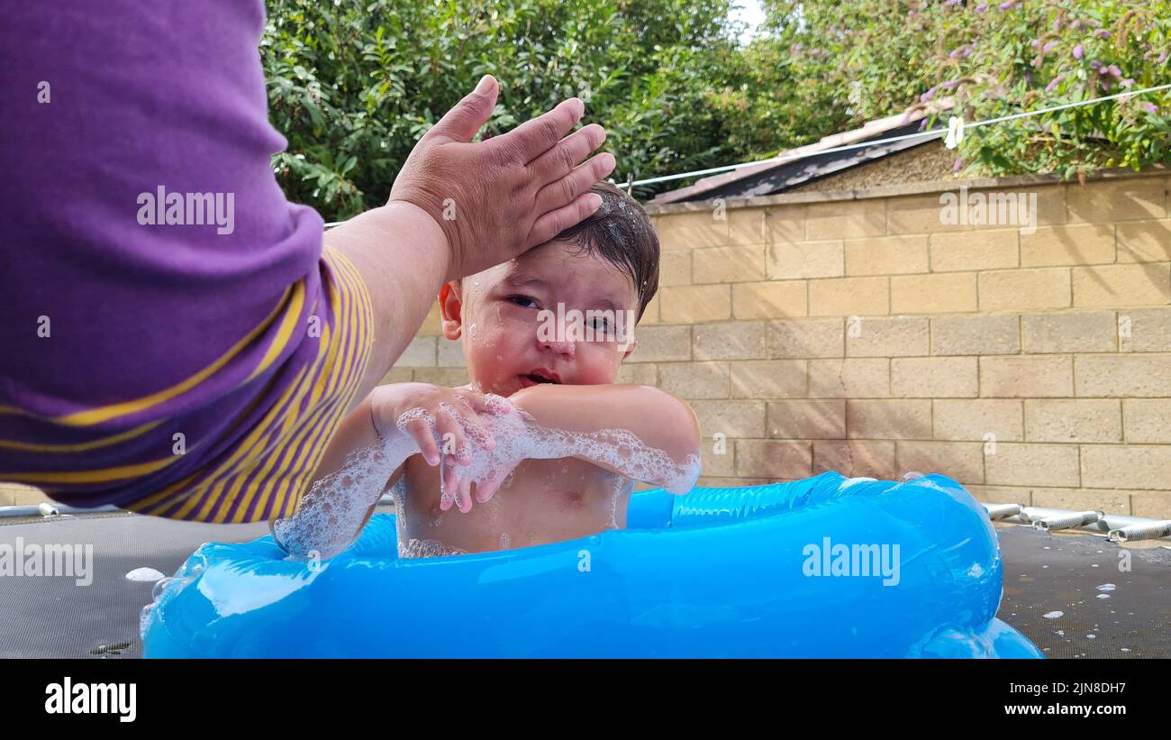 Cute 1 Year Old Pakistani Asian Baby Boy is Enjoying in Water Tub