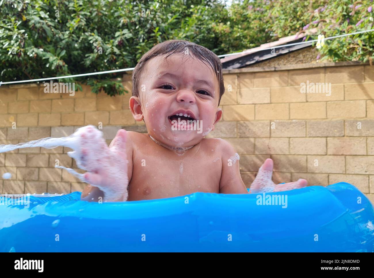 Baby boy in a tub people hires stock photography and images Alamy